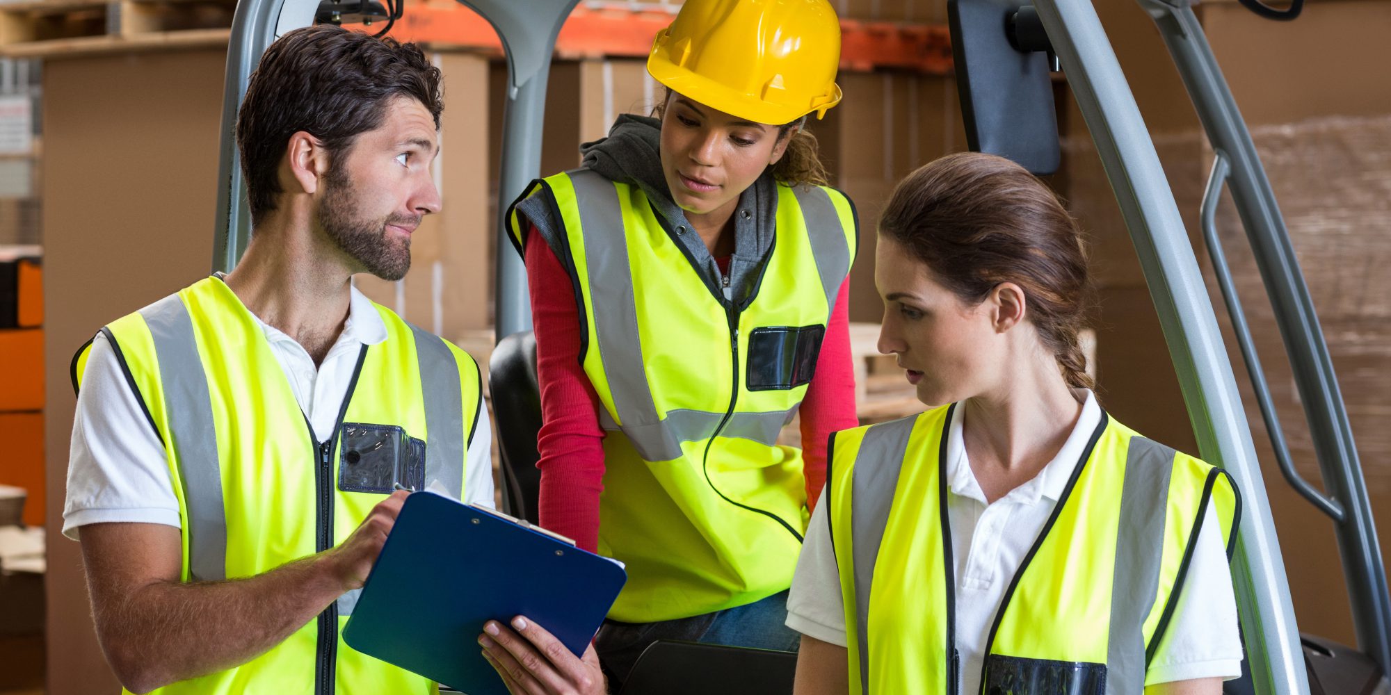 Portrait of workers are looking a clipboard Worknet Industries